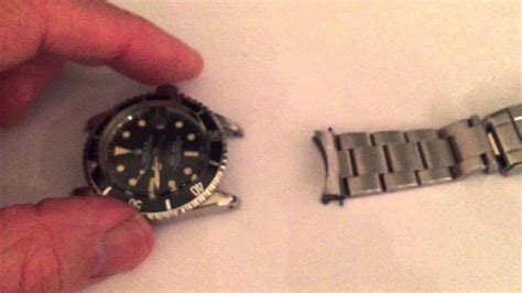 comment enlever un bracelet de montre rolex|removing Rolex bracelet from strap.